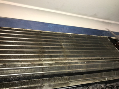 Mouldy split system aircon before Cairns aircon cleaning process by Vivid Cleaning Services